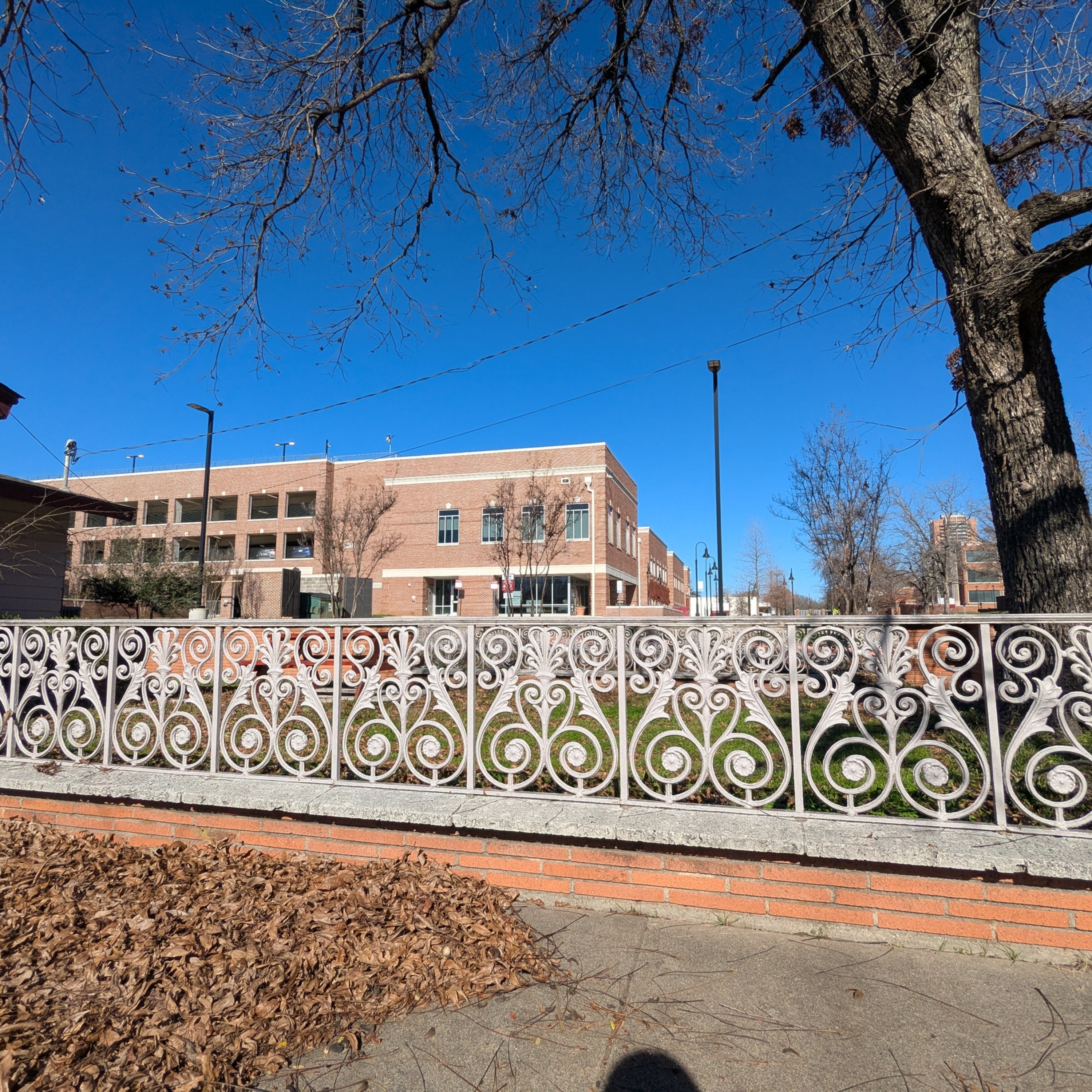 White iron latticework of the Baptist Student Union building at TWU.