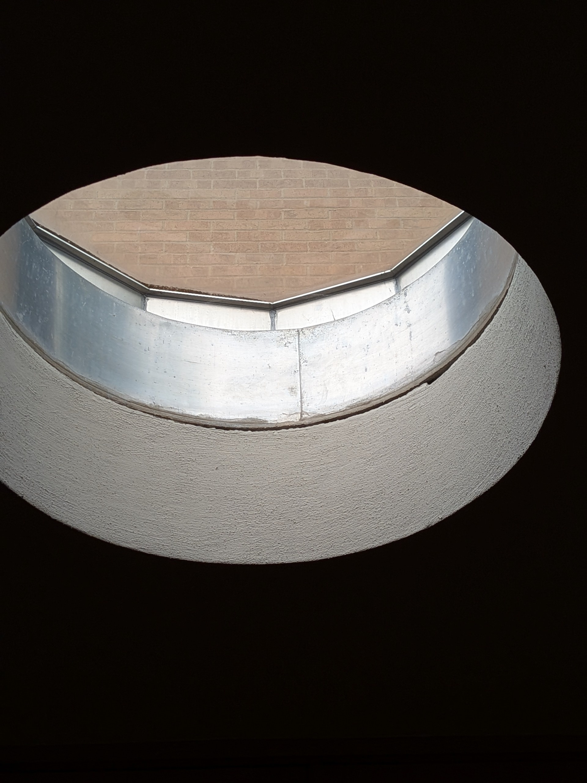 Close-up photo of one of the skylights by the City Council Chambers in Denton City Hall. It was taken on a cloudy day.
