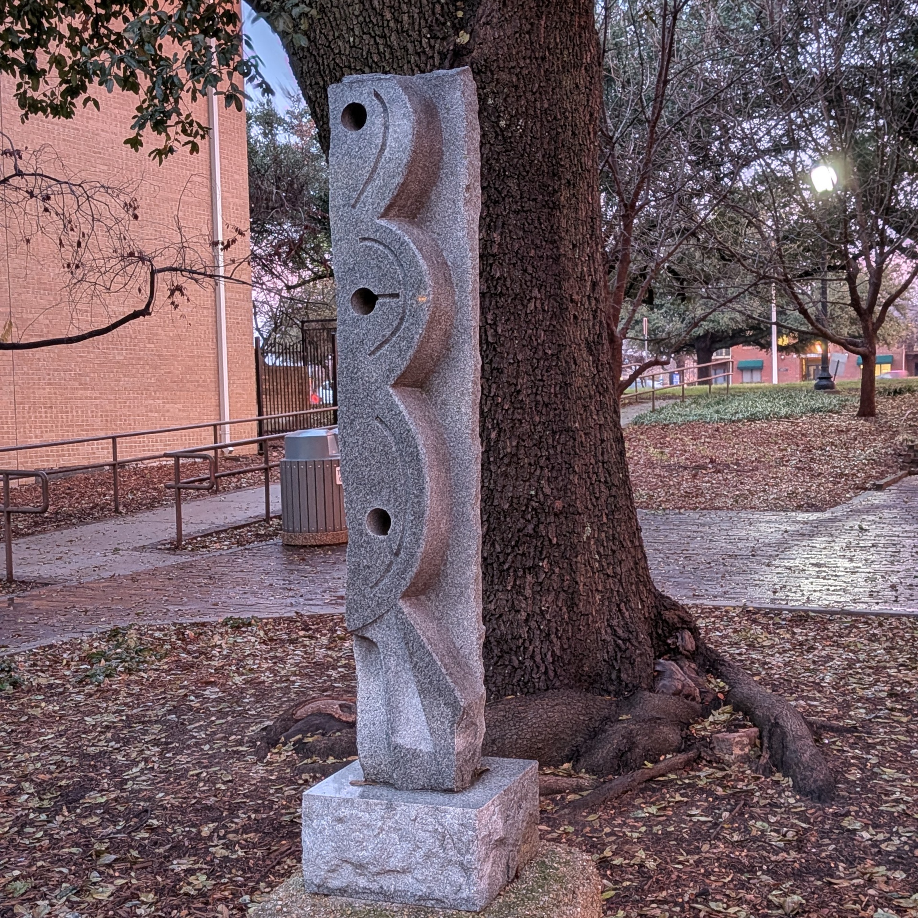 Three Graces sculpture in the waning light.